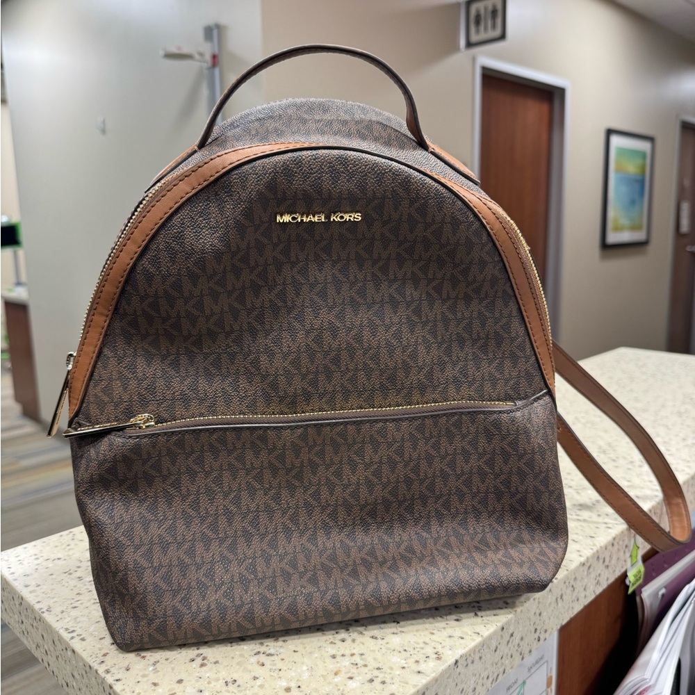 ‼️SOLD‼️Michael Kors Rhea Medium Signature Logo Brown Backpack with Gold Details